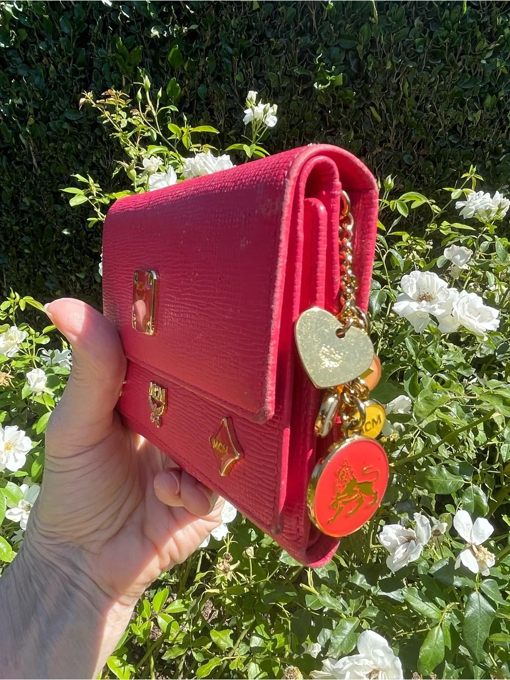 MCM Pink Leather Continental Wallet with Charm Accents & Gold Hardware”